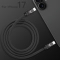 Top view of coiled black 240W silicone fast charging cable with anodized connectors, product shot. C to C