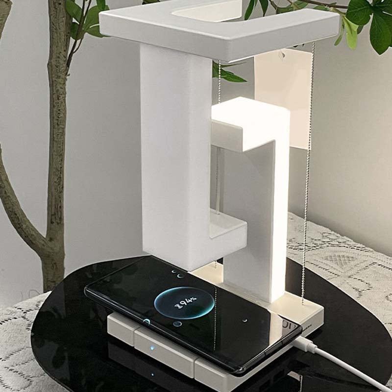 Creative Floating Cell Phone Wireless Charging Table Lamp