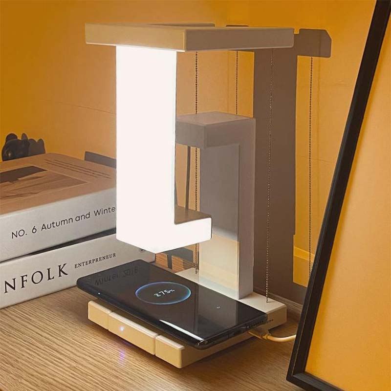 Creative Floating Cell Phone Wireless Charging Table Lamp