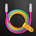 Rainbow gradient braided dual USB-C cable with yellow leather organizer strap.